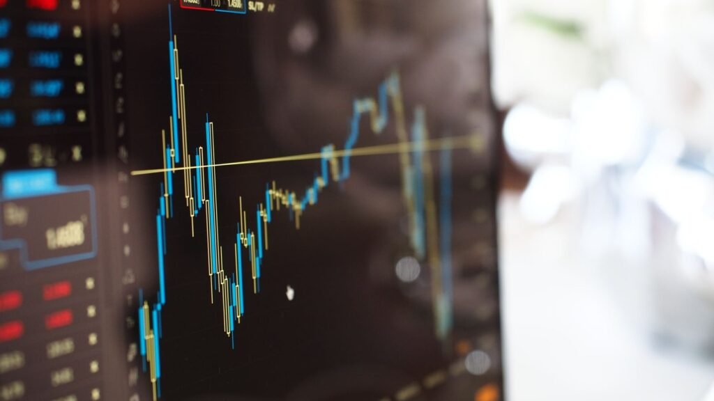 Écran de graphique boursier illustrant comment débuter en bourse