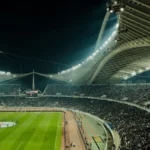 Stade comble illuminé de nuit, ambiance de France-Espagne au Mondial 2026
