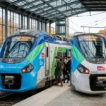 Rames de trains régionaux électriques modernes en gare française marquant le bilan de rentrée des transports décarbonés en septembre 2026